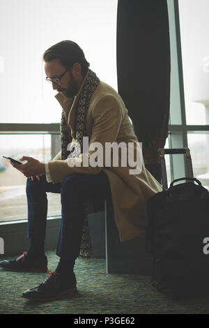 Businessman using mobile phone Stock Photo