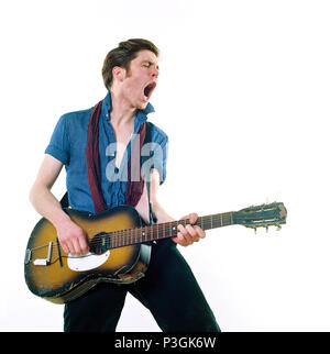 Charlie Waller lead singer of The Rumble Strips band, photographed against a white studio background, Old Street, London, England, United Kingdom. Stock Photo