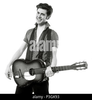 Charlie Waller lead singer of The Rumble Strips band, photographed against a white studio background, Old Street, London, England, United Kingdom. Stock Photo