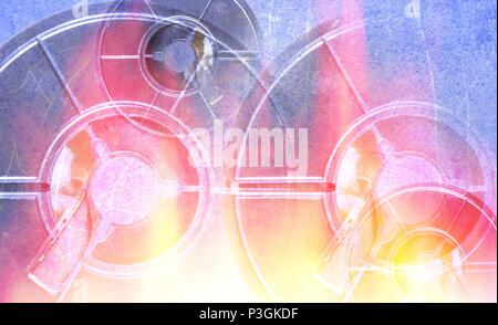 Old blue, red and yellow film reel on a scratched and rusty metal background. Stock Photo