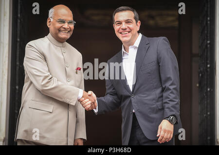 Athens - Greece, June 18, 2018: Greek Prime Minister Alexis Tsipras (R) shakes hands with India's President Ram Nath Kovind (L) at the Maximos Mansion, as Kovind arrived for official visit in Greece. Stock Photo