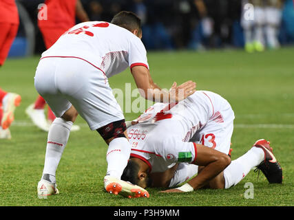 Volgograd, Russia. 18th June, 2018. Volgograd, Russia.  Soccer: World Cup, Tunisia vs England, preliminary round, group G, Volgograd Stadium. Tunisia's Ferjani Sassi (R) celebrating with Ali Maaloul his goal by penalty kick for the 1:1 equaliser. Credit: Andreas Gebert/dpa/Alamy Live News Credit: dpa picture alliance/Alamy Live News Stock Photo