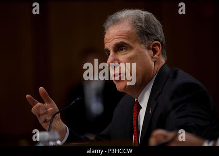 Washington, DC, USA. 18th June, 2018. U.S. Justice Department Inspector General Michael Horowitz testifies before the Senate Judiciary Committee during the hearing on 'Examining the Inspector General's First Report on Justice Department and FBI Actions in Advance of the 2016 Presidential Election' on the Capitol Hill in Washington, DC, the United States, on June 18, 2018. Credit: Ting Shen/Xinhua/Alamy Live News Stock Photo