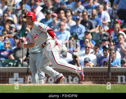 Philadelphia Phillies shortstop Scott Kingery (4) throws to first base  during a spring training baseball game against the Philadelphia Phillies on  March 26, 2023 at Ed Smith Stadium in Sarasota, Florida. (Mike