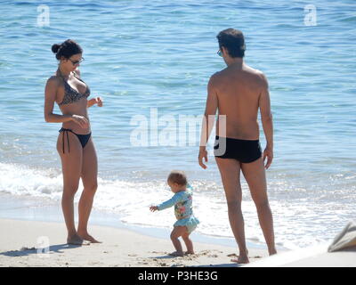 Cagliari 18, 06, 2018 Rodrigo Santoro on holiday in Sardinia with his wife Melanie Fronckowiak and their daughter Stock Photo