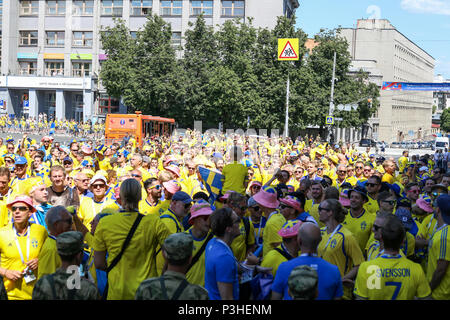 Nizhny Novgorod, Russia. 18th June, 2018. Swedish fans watching the Sweden vs South Korea game in the fan zone. The FIFA World Cup 2018 is the 21st FIFA World Cup which starts on 14 June and ends on 15 July 2018 in Russia. Credit: SOPA Images Limited/Alamy Live News Stock Photo