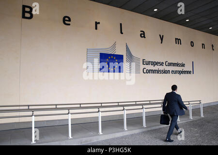 A man walks by the European Commissions Berlaymont building in Brussels, Belgium on June 19, 2018. Alexandros Michailidis/Alamy Live News Stock Photo