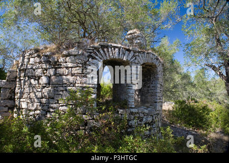 The ruins of the 6th century early Christian church of Agios Stefanos, near Ozias, Paxos, Greece Stock Photo