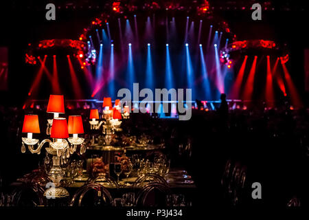 Pink and Purple Decor for corporate gala dinner banquet event Stock Photo