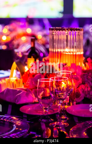 Pink and Purple Decor for corporate gala dinner banquet event Stock Photo