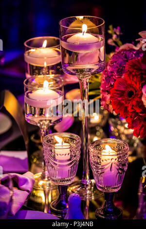 Pink and Purple Decor for corporate gala dinner banquet event Stock Photo