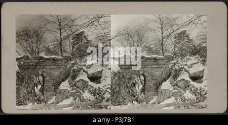 . View of snow covered rocks and bridge. Alternate Title: Central Park, New York, Mar. 1916.  Created: March 1916.  Coverage: 1915-1919. Source Imprint: 1915-1919.. Digital item published 2-16-2006; updated 6-4-2009. 364 View of snow covered rocks and bridge, from Robert N. Dennis collection of stereoscopic views Stock Photo