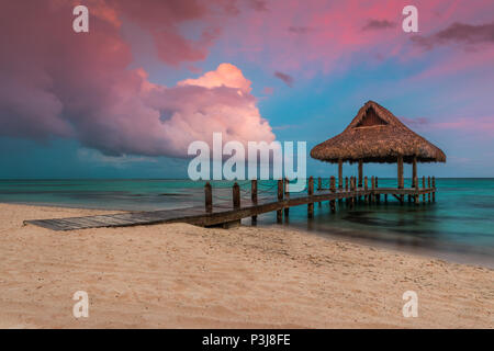 Dramatic clouds over the  Wooden Water Villa  in Cap Cana, Dominican Republic. Stock Photo