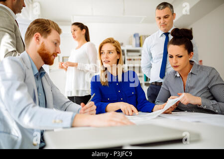 Business people having a board meeting Stock Photo