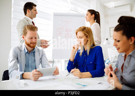 Succeful business partners brainstormin Stock Photo