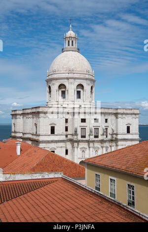 The white dome of the baroque Panteao Nacional (Santa Engracia Church) over red tile roofs of the Alfama district in Lisbon, Portugal Stock Photo