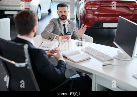 Businessman Choosing Car Stock Photo