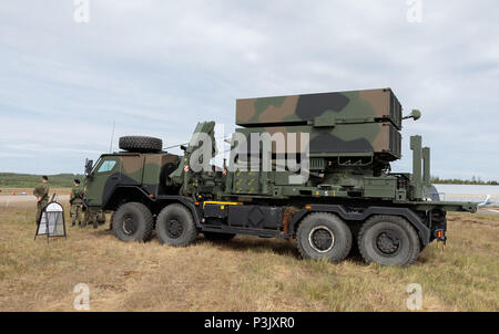 Sisu E13TP 8 x 8 high-mobility tactical military truck as launcher vehicle of the NASAMS 2 surface-to-air missile system of the Finnish Army. Stock Photo