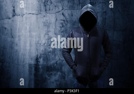 Hacker standing alone in dark room. Empty space for text or draw Stock Photo
