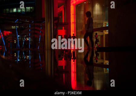 Singapore, Republic of Singapore, office workers leave bank building Stock Photo