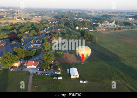 Aerial view of hot air balloon flying over farm, Lancaster County, Pennsylvania, USA Stock Photo