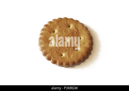 Classic round golden yellow salted cracker isolated on over white background Stock Photo