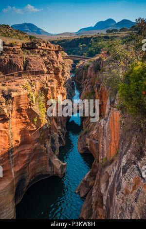 A portrait/vertical shot of the gorge at Bourke’s Luck Potholes in Mpumalanga, South Africa; a geological formation carved out by the movement of wate Stock Photo