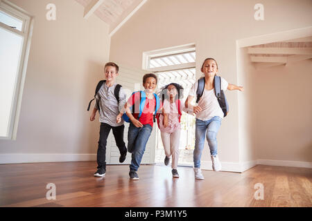 Group Of Children Returning Home After School Day Stock Photo