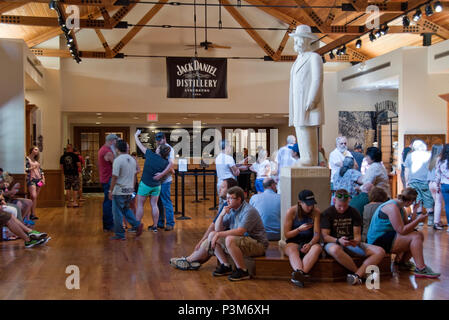 Tourists wait for a guided tour inside the Jack Daniel Distillery visitor center, where Jack Daniel's Tennessee whiskey is produced, Lynchburg, Tennes Stock Photo