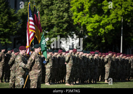 PANZER KASERNE, Germany – Soldiers, 1st Battalion, 10th Special Forces Group (Airborne) stand in formation during the unit's change of command ceremony, here, July 7, 2016. 1st Bn. 10th SFG(A) is one of two forward stationed battalions within Special Forces tracing its history to 10th SFG(A) establishment in Bad Tolz, Germany in 1953. 1st Bn. 10th SFG(A) moved Panzer Kaserne on Aug 1991 where it is still based today. (U.S. Army photo by Staff Sgt. Marcus Fichtl) Stock Photo