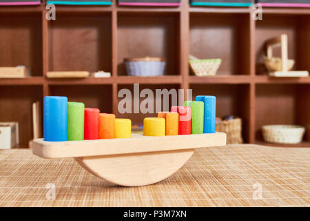 Colurful Math Scale Montessori wooden colorful scale for learning math Stock Photo - Alamy