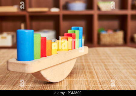 Colurful Math Scale Montessori wooden colorful scale for learning math Stock Photo - Alamy