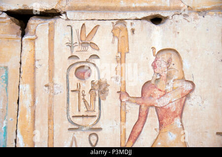 Colorfully painted bas relief stone carvings at the Great Osiris Temple, Abydos, Egypt. Stock Photo