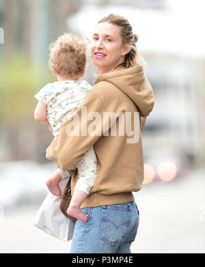 Whitney Port greets her son Sonny after picking up lunch at Joan's on