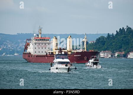 ISTANBUL, TURKEY - MAY 24 : View of a ship and boats cruising down the Bosphorus in Istanbul Turkey on May 24, 2018. unidentified people Stock Photo