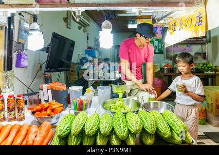 JIUFEN, TAIWAN - AUGUST 17: Taiwanese smoothie shop selling fresh smoothies made from exotic fruits on August 17, 2014 in Jiufen Stock Photo