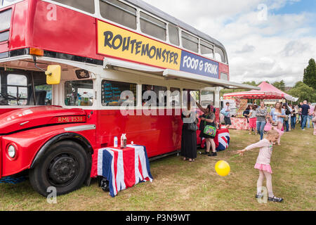Routemaster bus used as mobile food van or burger bar at an English summer fair Stock Photo