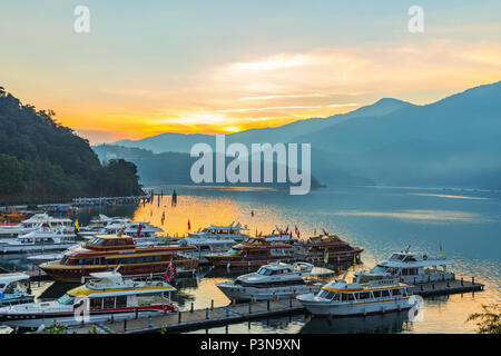 NANTOU, TAIWAN - SEPTEMBER 05: Early morning sunrise at the famous Sun Moon Lake, a popular tourist destination on September 05, 2014 in Nantou Stock Photo