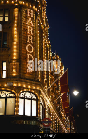 London, UK - December 2017. The famous luxury department store Harrods in Knightsbridge decorated with Christmas lights. Stock Photo