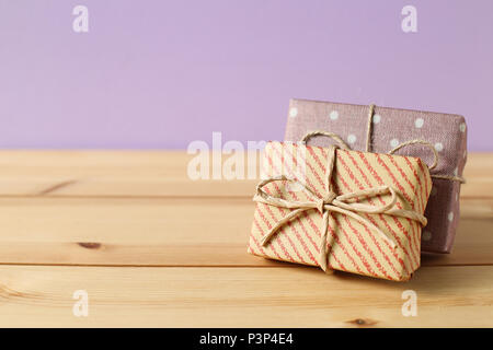 Gift boxes on wooden table Stock Photo