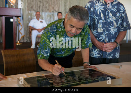 160721-N-AV234-204 PEARL HABOR (July 21, 2016) Governor of Hawaii David Y. Ige, signs a lease agreement between the Department of the Navy and Hawaii Electric Company at Historic Hickam Officers’ Club at Joint Base Pearl Harbor-Hickam.  The DON and Hawaii Electric Company are developing a solar facility on JBPHH. The project will enable the DON to meet critical energy and security goals as well as further Hawaiian Electric’s commitment to renewable energy to the state. (U.S Navy Photo by Mass Communications Specialist 2nd Class Somers Steelman/RELEASED) Stock Photo