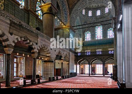 ISTANBUL, TURKEY - MAY 26 : Interior view of the Blue Mosque in Istanbul Turkey on May 26, 2018. Two unidentified people Stock Photo