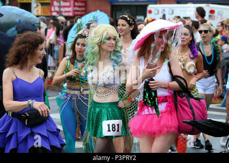 NEW YORK, NY - JUNE 17: Colorful and creative participants of the 35th Mermaid Parade held on Coney Island in Brooklyn on June 17th, 2017 in New York, Stock Photo