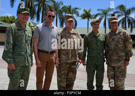 From left to right, Col. Tee Wee Hong, chief of staff, 6th Div., Singapore Armed Forces (SAF); Secretary of the Army Eric Fanning; Col. Robert Ryan, commander, 3rd BCT, 25th ID; Col. Bervyn Lee, commander, 9th Inf. Bde., 6th Div., SAF; and Maj. Gen. Charles A. Flynn, commander, 25th ID, stand together at the 298th Regiment, Multi-Functional Training Unit (MFTU), Regional Training Institute (RTI), Waimanalo, Hawaii, on July 26, 2016. Fanning toured where U.S. and Singapore command teams are training at during exercise Tiger Balm 16. (U.S. Army photo by Staff Sgt. Armando R. Limon, 3rd Brigade P Stock Photo