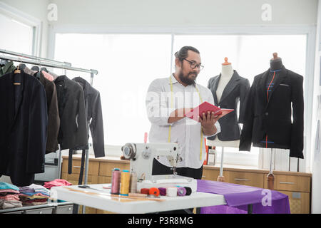male tailor in his workshop Stock Photo