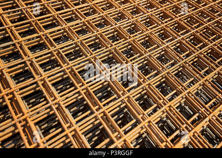 Wire mesh steel Rebars for reinforced concrete - Rebar Reinforcing Wire Construction. Steel reinforcement bar texture in construction site. Iron rods. Stock Photo