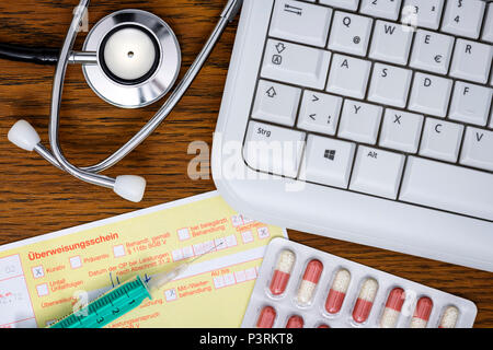 Stethoscope, computer keyboard, referral and tablets, telemedicine and remote treatment Photo icon, Stethoskop, Computertastatur, Überweisungsschein u Stock Photo