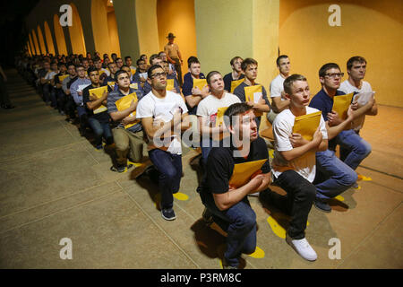 New recruits of Alpha Company, 1st Recruit Training Battalion, receive a Uniform Code of Military Justice brief at Marine Corps Recruit Depot San Diego, May 8. At this point, recruits are informed of the articles of the UCMJ that apply to them while they are in recruit training. Annually, more than 17,000 males recruited from the Western Recruiting Region are trained at MCRD San Diego. Alpha Company is scheduled to graduate Aug. 4. Stock Photo