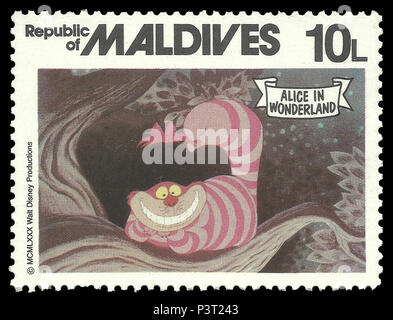 Republic of Maldives - stamp 1980: Color edition on Walt Disney, shows Alice in Wonderland  and fairy tale character Stock Photo