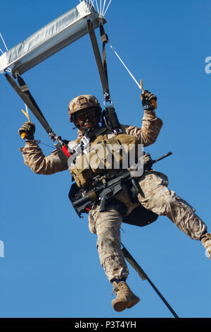 A special operations forces Soldier descends toward MacDill Air Force ...